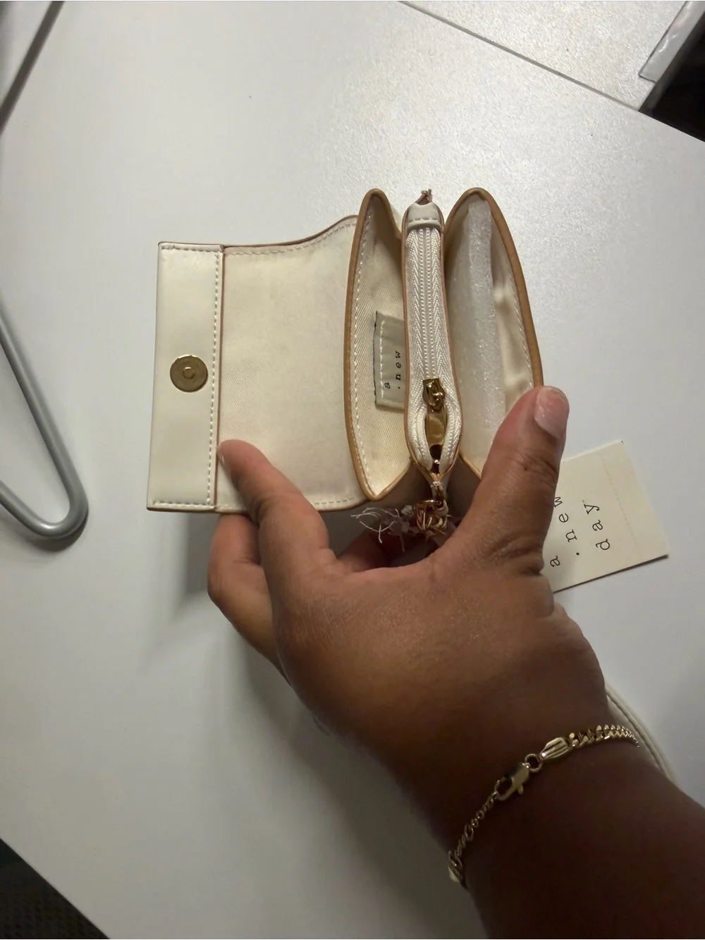 a new day Cream Wristlet Key Case with Gold Hardware
